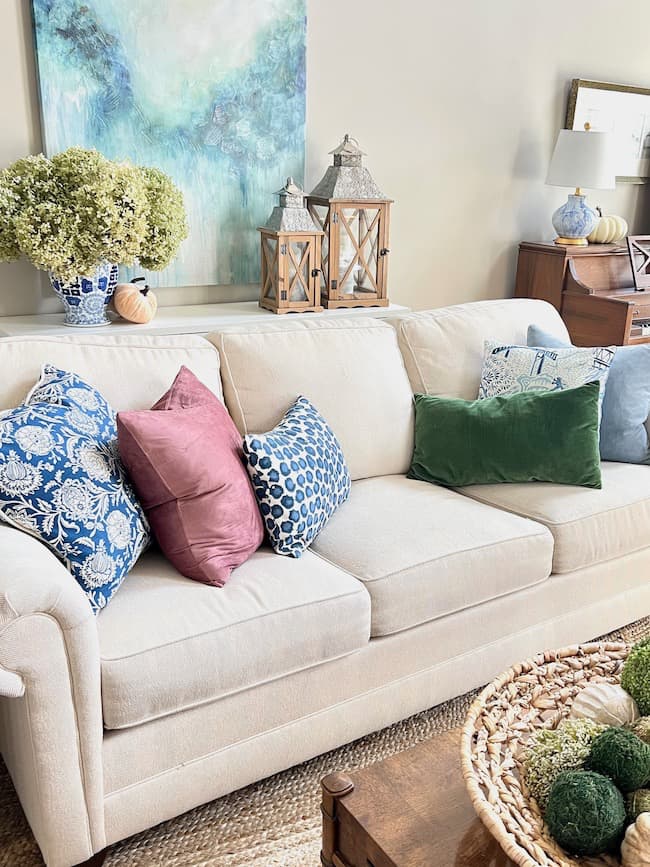 Fall Home Tour Living Room Decor -- Jewel tone Pillows on Sofa