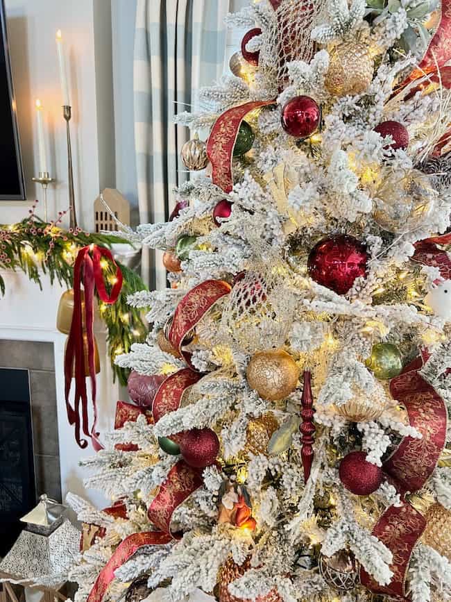 Snowy Christmas tree with Burgundy Ornaments