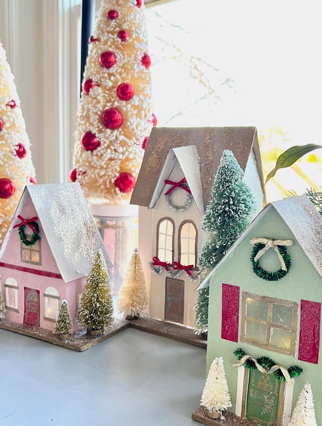 Make your own colorful DIY Christmas Village houses.