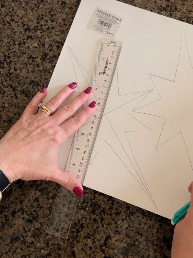 Use a ruler to draw the fold lines.