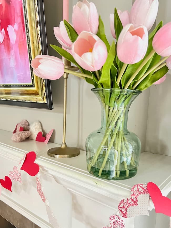 Faux pink tulips on the mantle for Valentine's Day