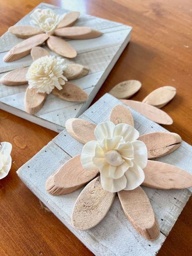 Bare wood spring floral art with wood slices and wood flowers
