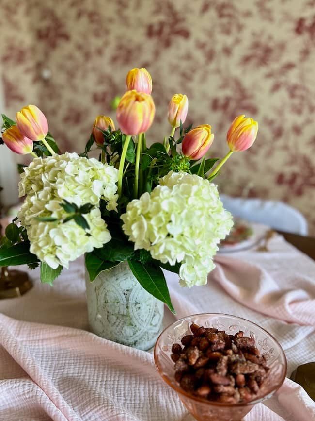 Bridal shower brunch flower arrangements with coral tulips and white hydrangeas