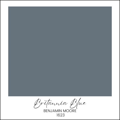 A color swatch showing a medium-dark blue shade with the name "Britannia Blue" and the branding "Benjamin Moore 1623" written below the swatch.