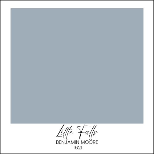 A swatch of Benjamin Moore paint in the color "Little Falls" (1621). The swatch is a light, dusty blue color. Text underneath reads: "Little Falls" and "Benjamin Moore 1621.