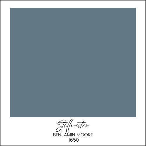 A paint swatch for Benjamin Moore's "Stillwater" (1650) is shown. The color is a medium-dark blue-gray with a muted tone. The swatch has the color name and number written below in a stylish font.