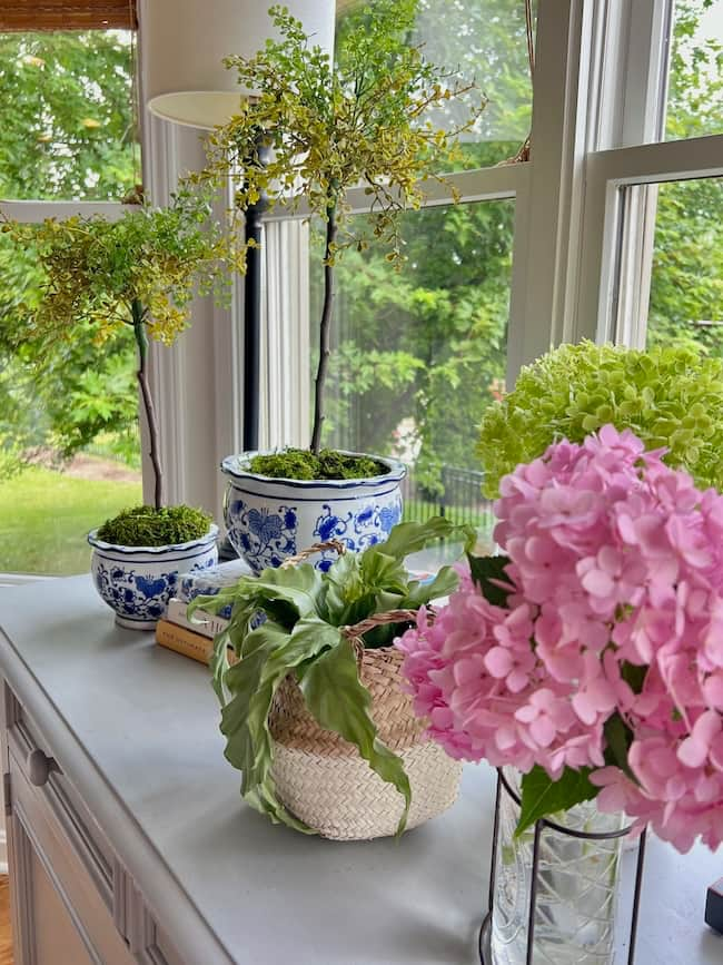 Decorate with topiaries on the kitchen buffet with fresh cut hydrangeas.