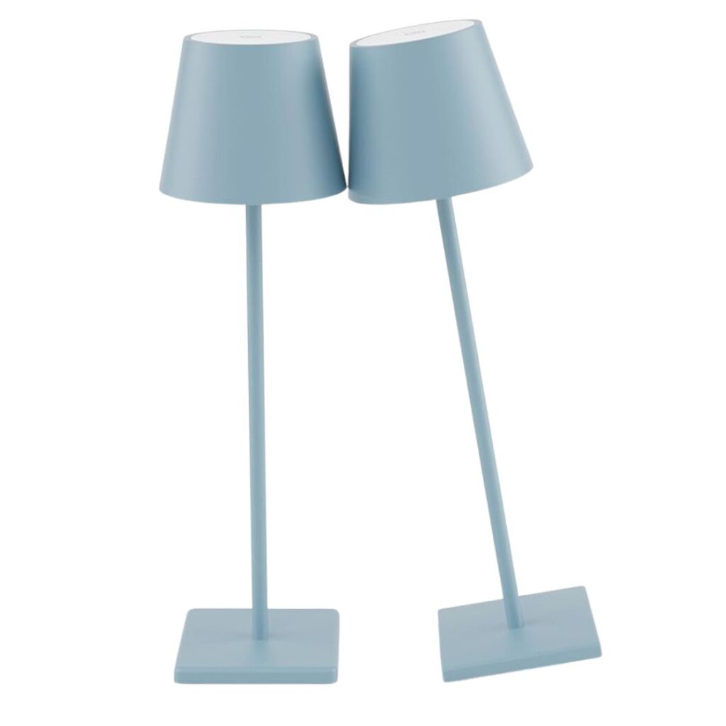 Two light blue modern table lamps with slender poles and cone-shaped shades stand side by side at a slight angle on square bases. The clean, minimalist design gives them a contemporary look, perfect to set a pretty summer table.