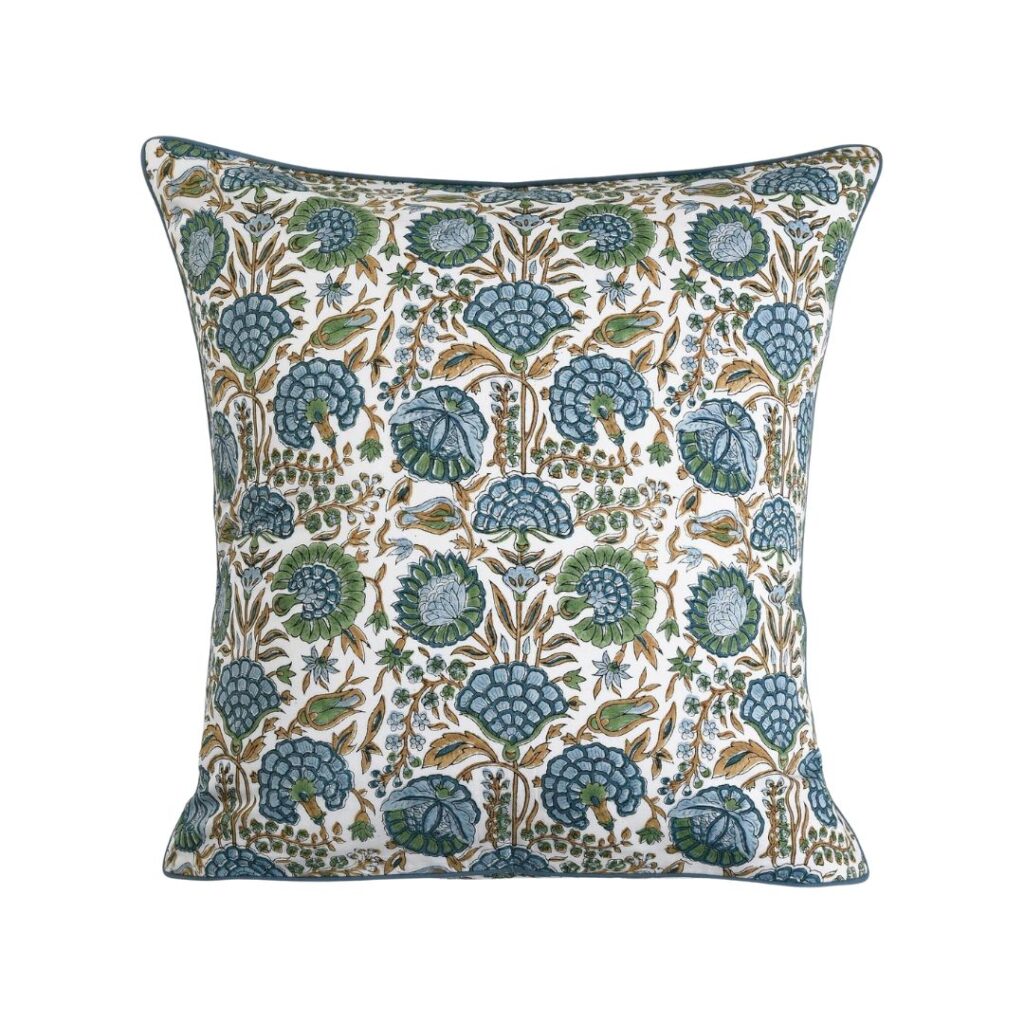 Square decorative pillow with an intricate floral pattern in blue and green hues. The detailed design features blooming flowers and foliage on a white background, edged with matching patterned trim. This budget-friendly option adds a touch of elegance to any space.