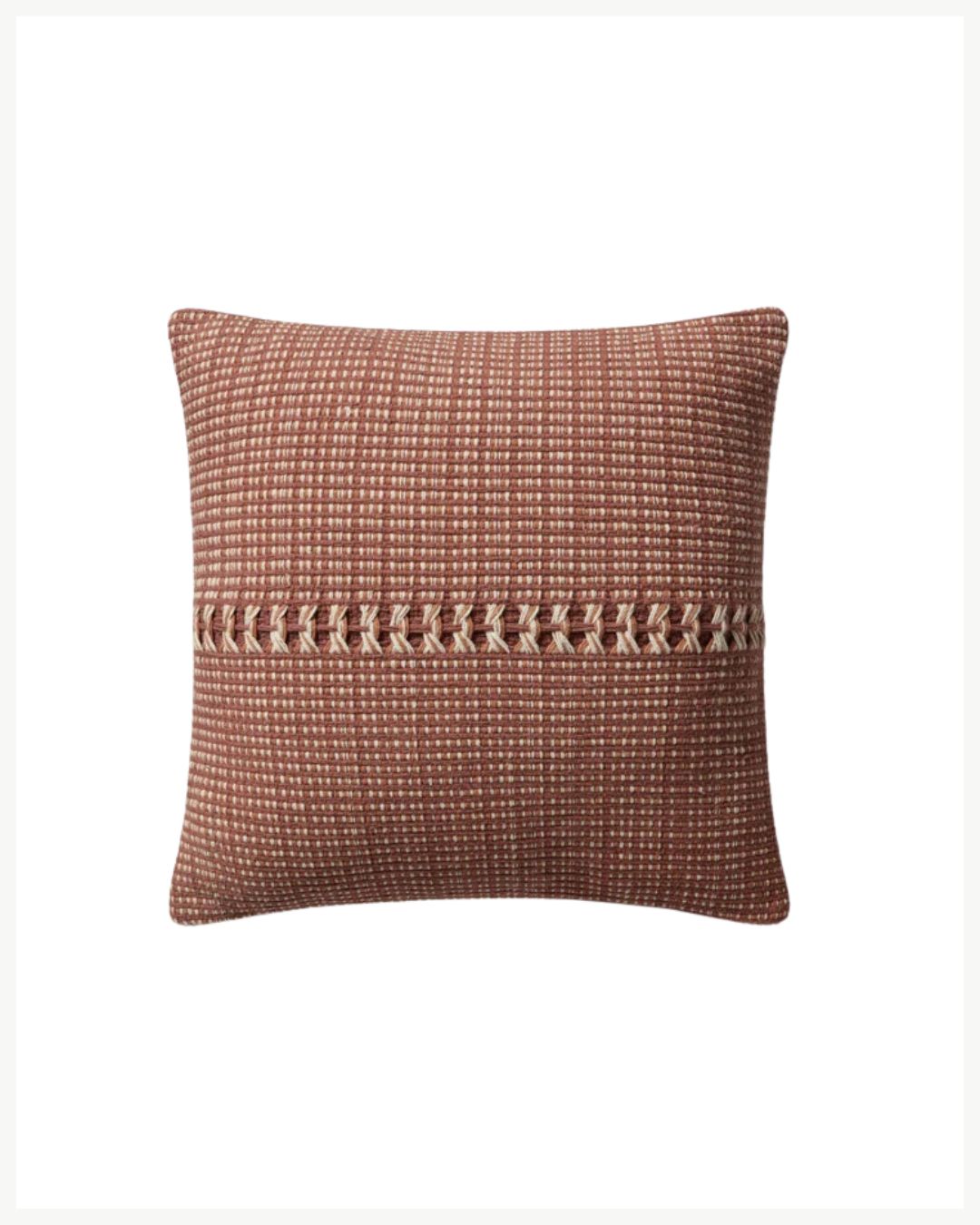 A square brown pillow with a textured pattern of small, evenly spaced, light-colored dots. It features a horizontal strip in the center that has intricately woven details, adding a moody fall twist to any cozy living room decor. The background is plain white.