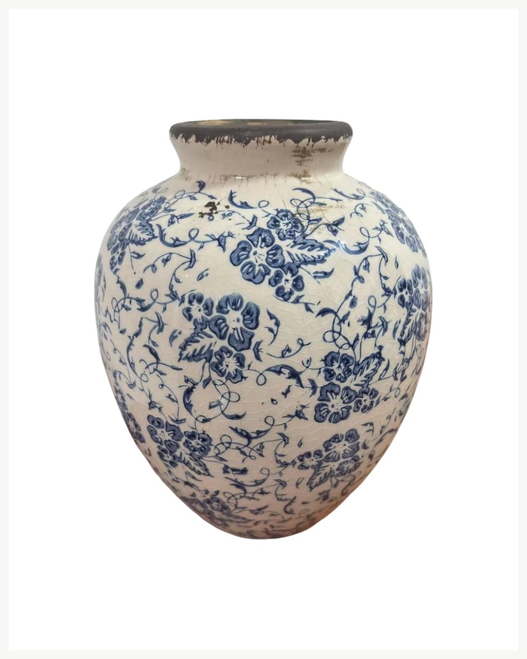 A ceramic vase with a wide round body, decorated with intricate blue floral patterns on a white background and a slightly weathered, darkened rim—perfect for cozy living room decor ideas.