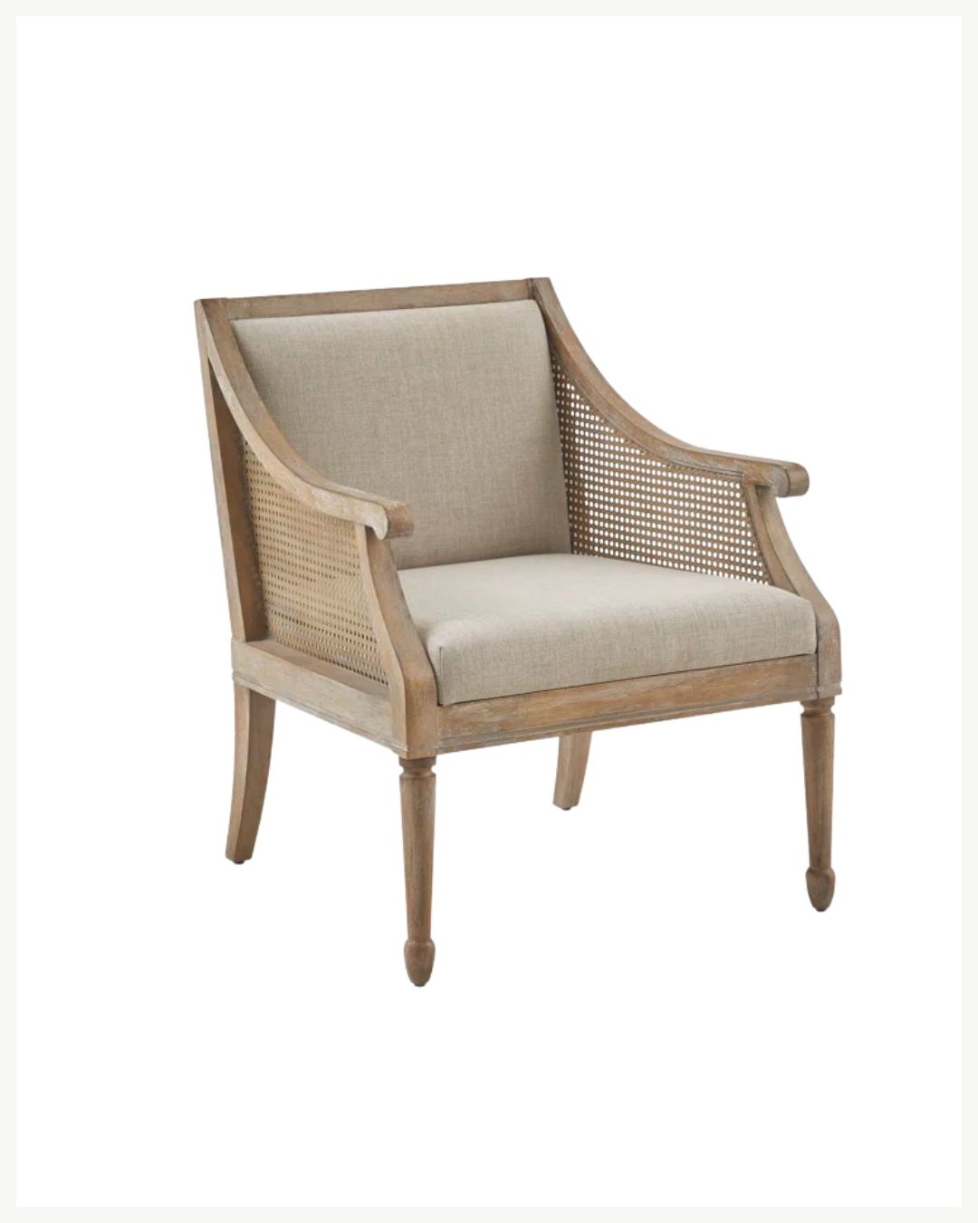 A wooden armchair with light beige upholstered seat and backrest, featuring woven cane sides and gently curved arms—an inviting addition for cozy living room decor ideas, set against a white background.