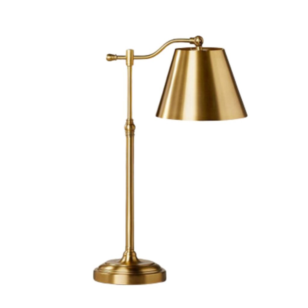 A sleek, modern gold desk lamp with an adjustable arm and a conical shade. The lamp features a round base and slim, elegant stem, all finished in a polished gold tone. The design is contemporary and minimalistic, perfect for a sophisticated workspace.