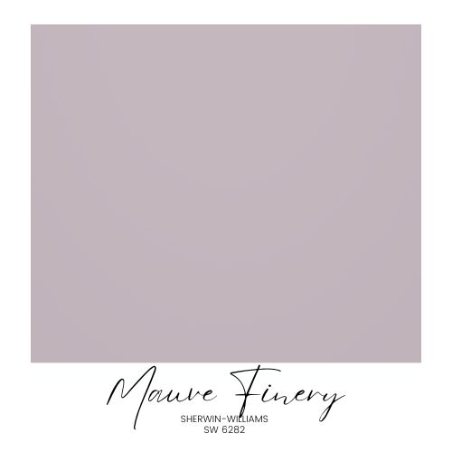 A color sample from the Sherwin-Williams Color Capsule 2025 collection features "Mauve Finery," SW 6282. The square reveals a muted mauve tone with both the brand and color name elegantly written below, inspired by Anthropologie's unique aesthetic.