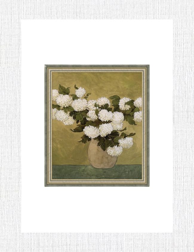 A framed painting of white hydrangeas in a beige vase against a green background brings a touch of spring to your space. The piece is bordered with a thin green frame, perfect as entryway decor on a textured light gray wall.