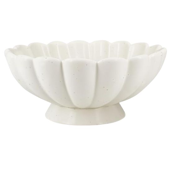 A white ceramic bowl with a scalloped, flower-like edge and a short pedestal base, perfect for those seeking inspiration on how to decorate a footed bowl, viewed from the side against a plain background.