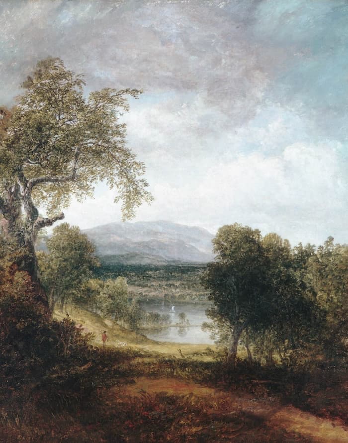 A serene landscape painting showing trees in the foreground, a lake in the middle ground, distant mountains, and a partly cloudy sky. Discover free fine art prints featuring a small figure standing near the water’s edge.